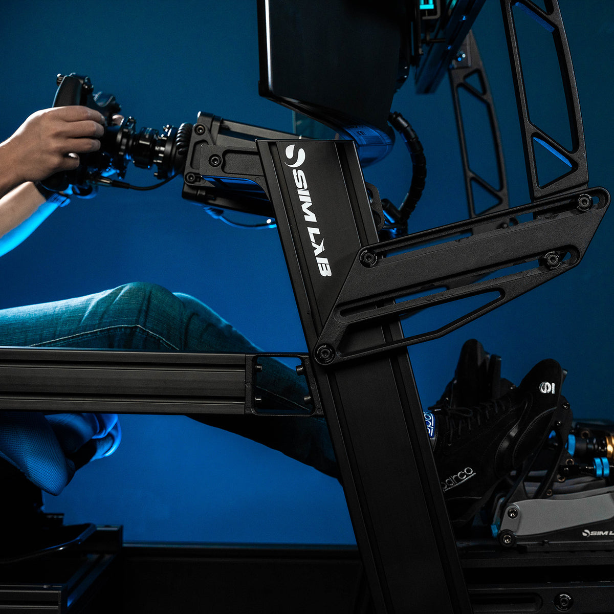 Close-up of the P1X Pro tilted uprights during a sim racing session.